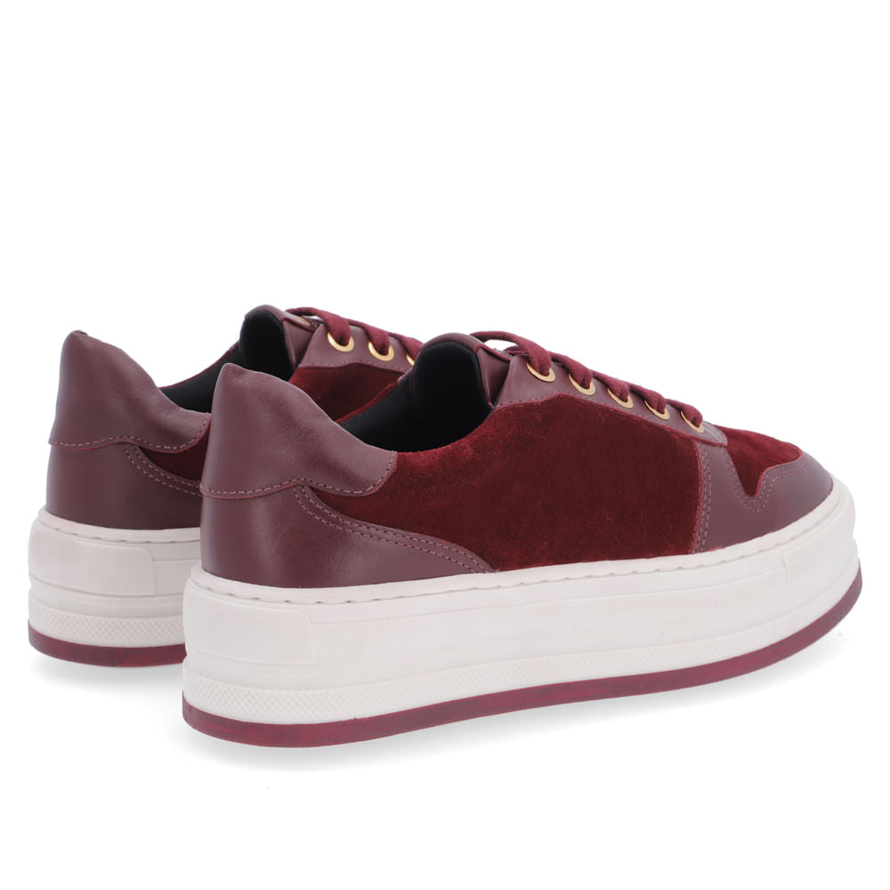 Baskets à plateforme en cuir bordeaux avec œillets