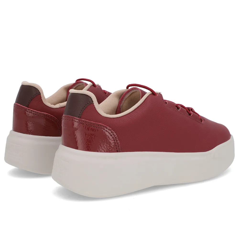 Baskets en cuir rouge à semelle haute et lacets élastiques