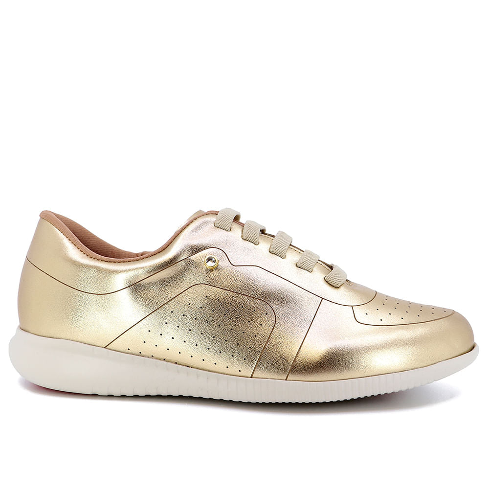 Baskets décontractées en cuir doré avec détails laser