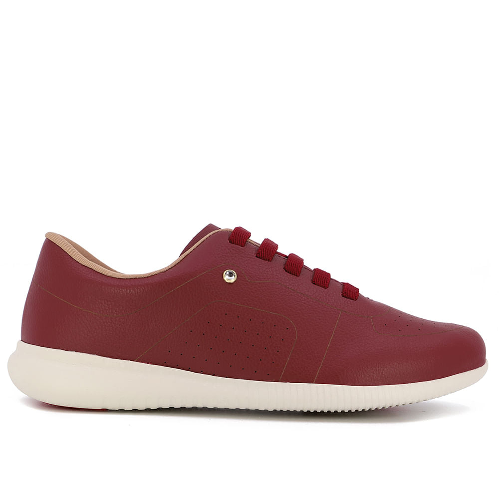 Baskets décontractées en cuir rouge avec détails laser