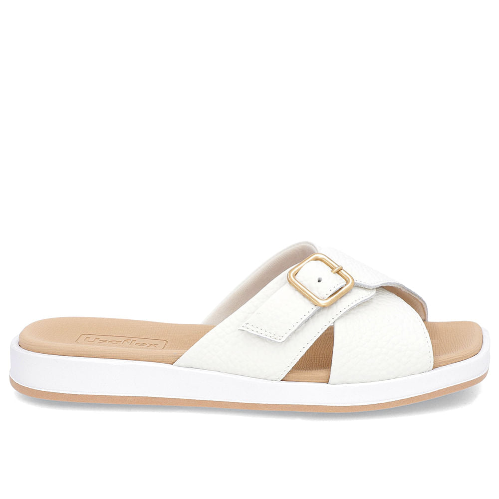 Claquettes blanches à talon bas et ornements en cuir