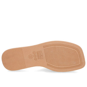 Claquettes blanches à talon bas et ornements en cuir