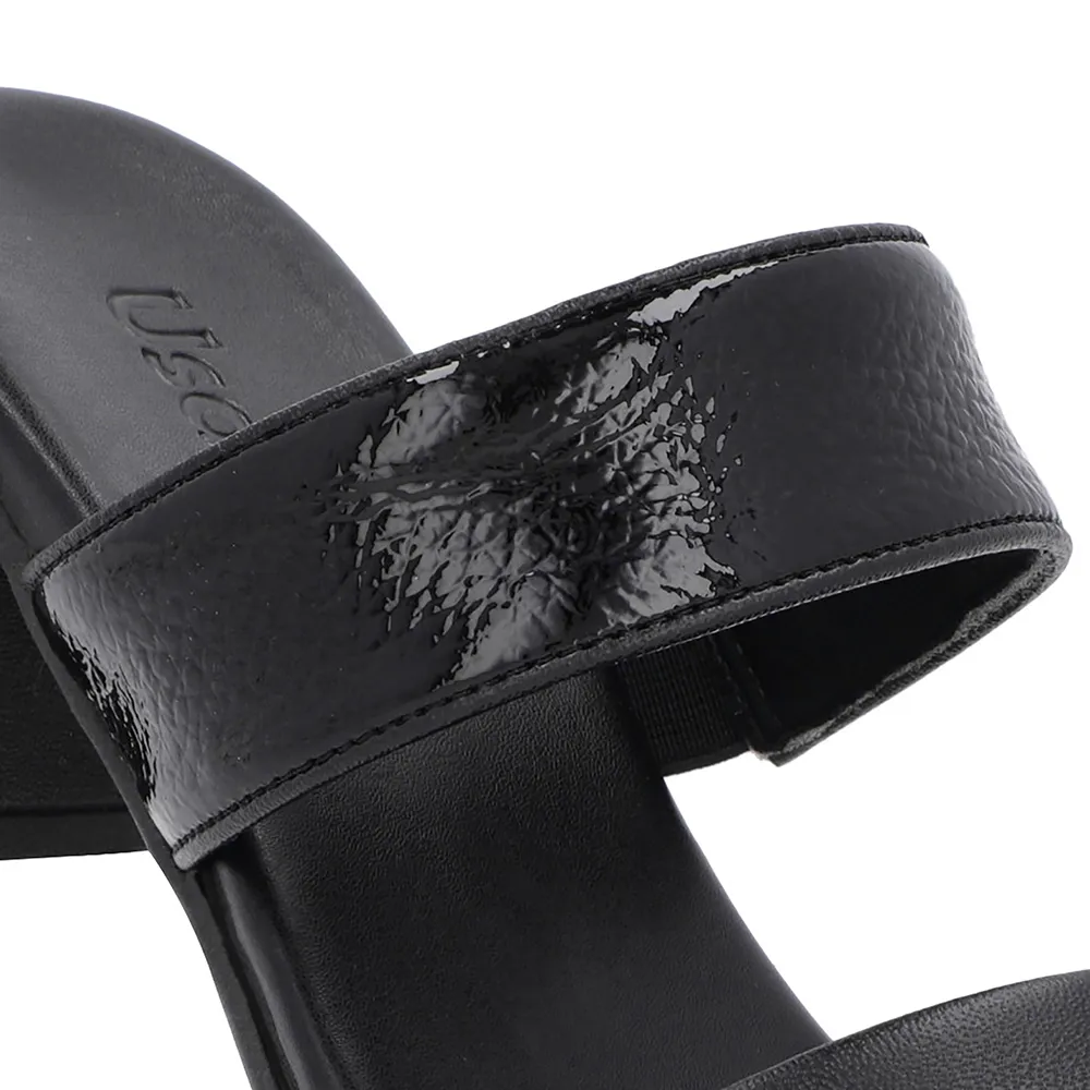Sabots noirs à talons blocs et brides