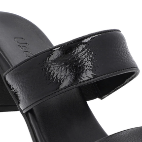 Sabots noirs à talons blocs et brides