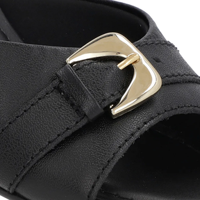 Sabots ornés de cuir noir