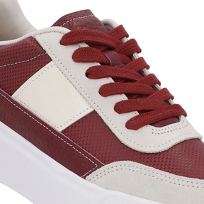 Baskets en cuir rouge à semelle haute et détails blanc ivoire